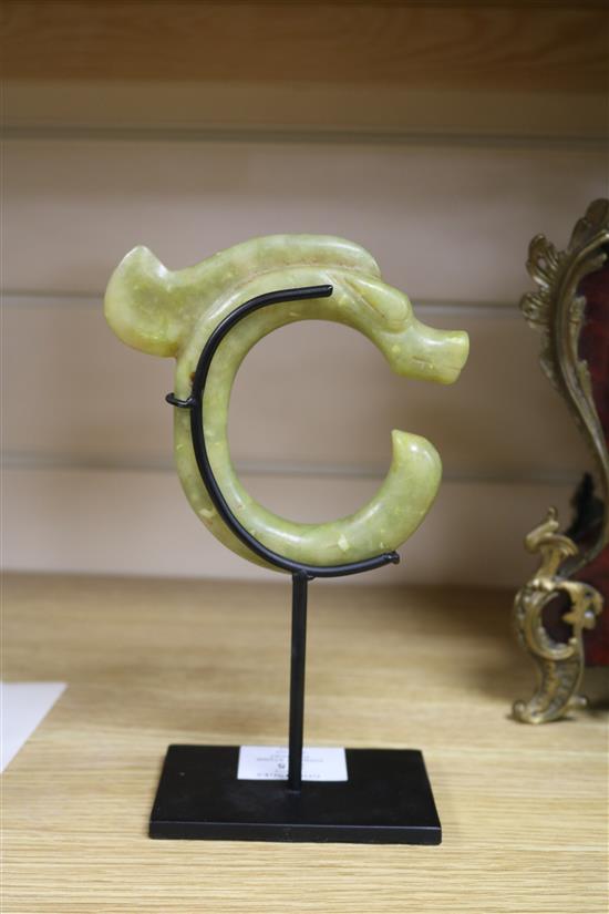 A Chinese yellow carved stone pendant